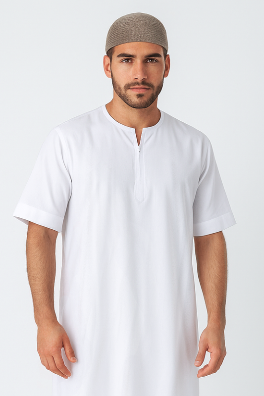 Man wearing a white thobe with a brown headscarf on a white background